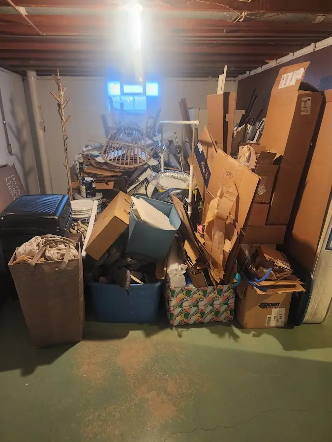 Roll-off dumpster container at job site for 15 Yard Dumpster Rental in Bennington